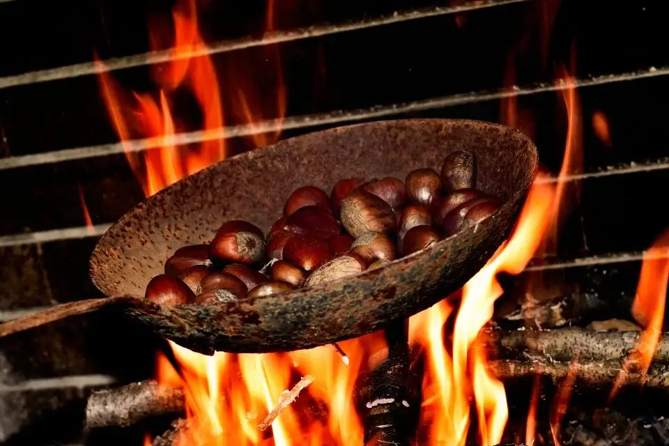 "How to Roast Chestnuts" - Chestnuts in pan on fire
